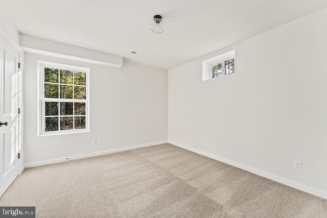 view of carpeted spare room