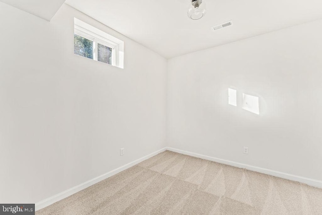 basement featuring carpet flooring