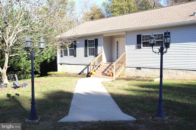 view of front of home with a front lawn