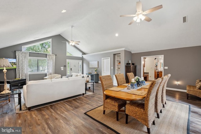 dining area featuring wood-type flooring, high vaulted ceiling, and ceiling fan