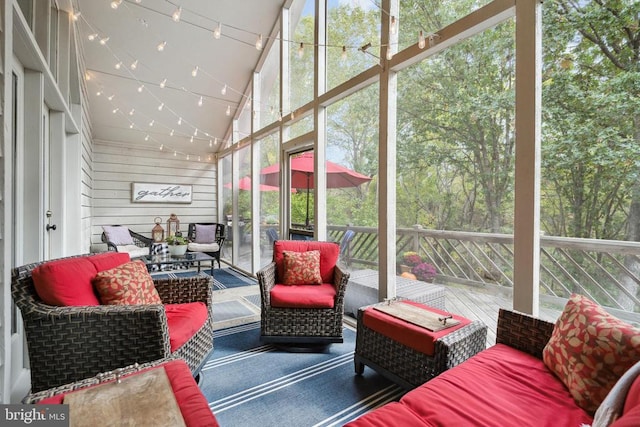 sunroom with vaulted ceiling