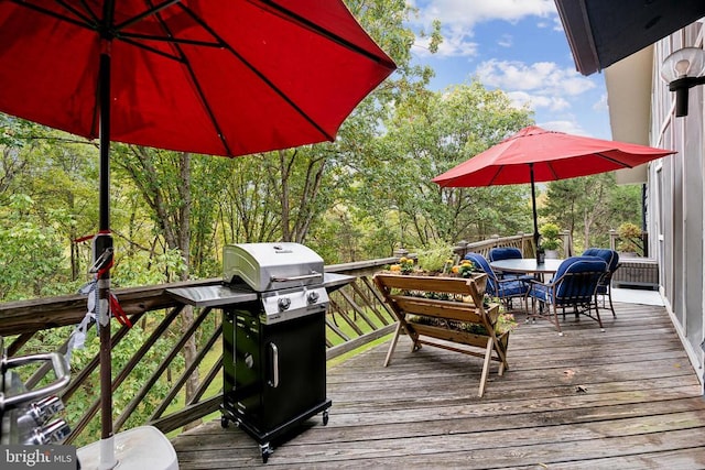 wooden deck featuring grilling area