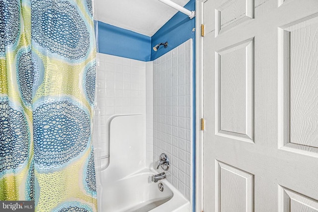 bathroom with shower / bath combo