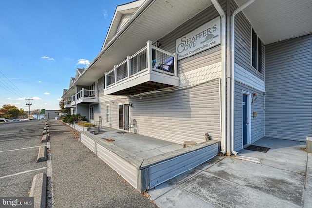 view of property exterior featuring a balcony