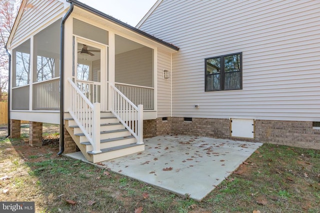 entrance to property with a patio area