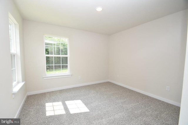 view of carpeted spare room