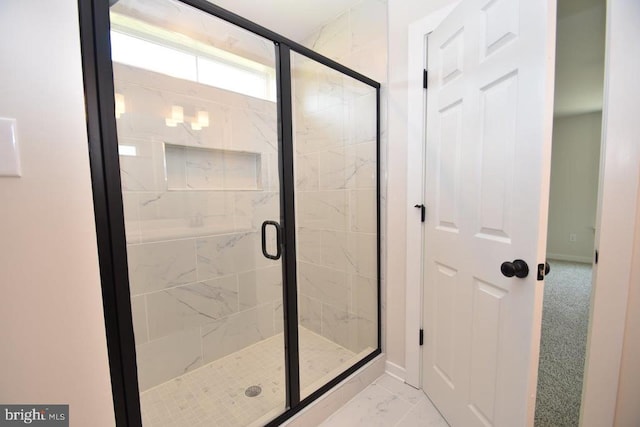 bathroom with an enclosed shower