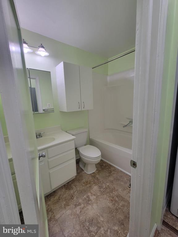 full bathroom with vanity, toilet, and shower / bathtub combination