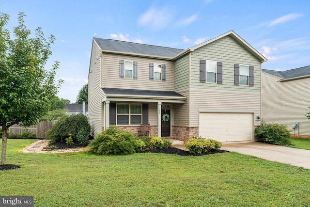 view of front facade with a front lawn and a garage