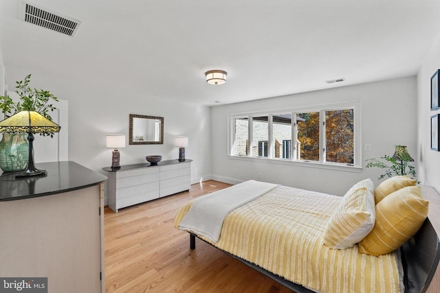 bedroom featuring light hardwood / wood-style flooring