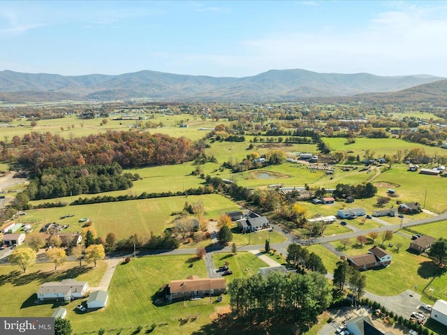 birds eye view of property featuring a mountain view