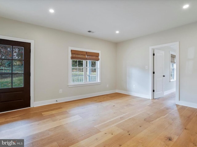 entrance foyer with light wood-type flooring