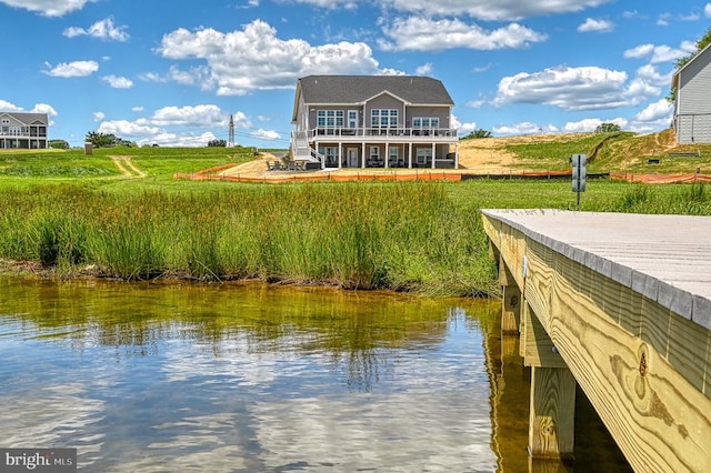 exterior space with a water view