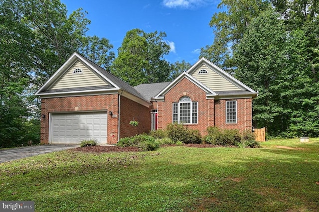 view of front of house with a garage and a front lawn