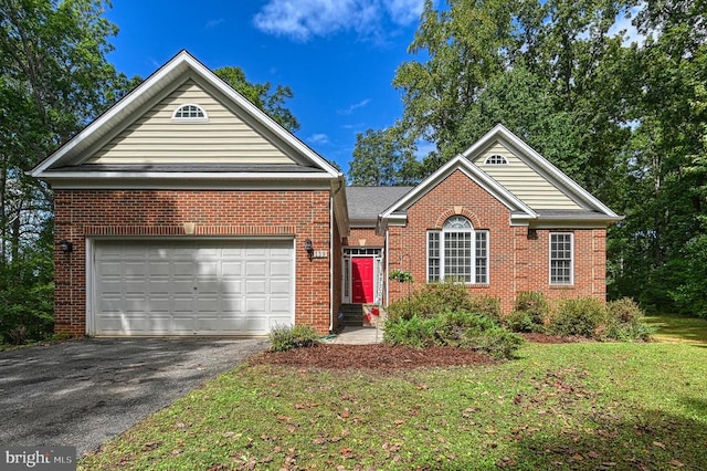 front facade featuring a garage and a front yard