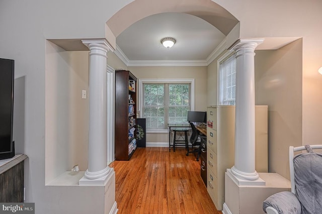 office area featuring light hardwood / wood-style flooring and ornamental molding