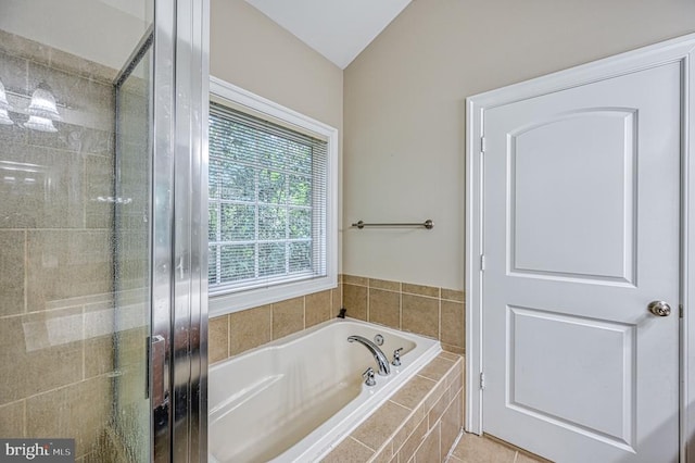 bathroom with separate shower and tub