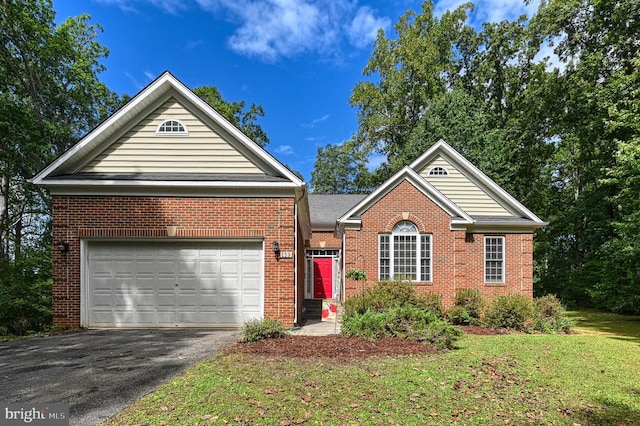 view of front property with a front yard and a garage