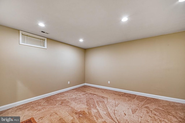 empty room featuring carpet floors