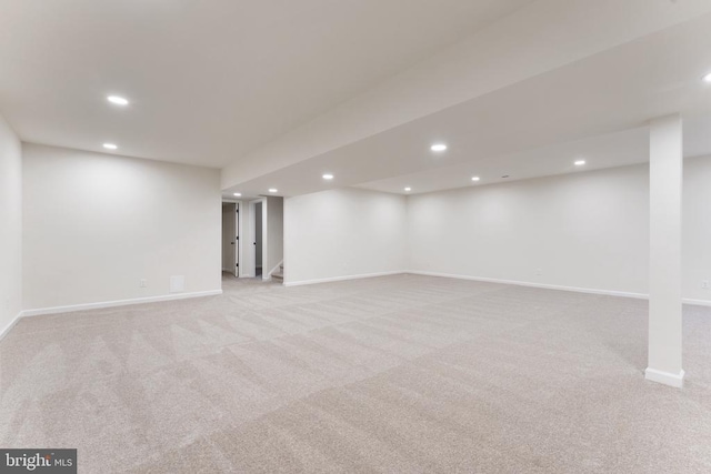 basement with light carpet