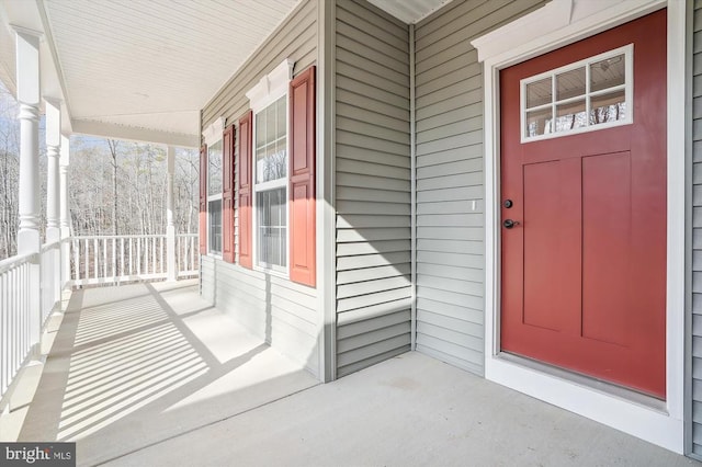 doorway to property featuring a porch