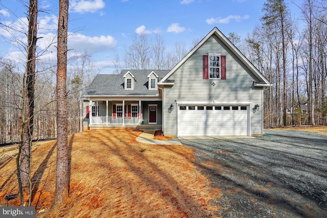 front facade featuring a garage and covered porch