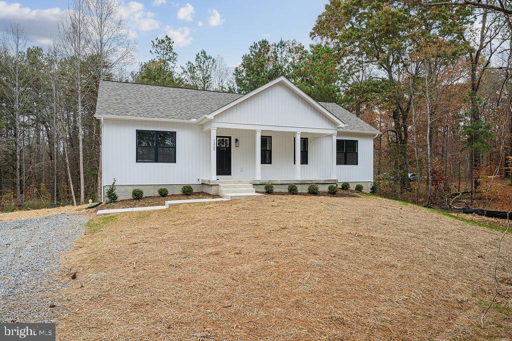 modern farmhouse with covered porch