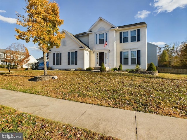 view of front facade with a front yard