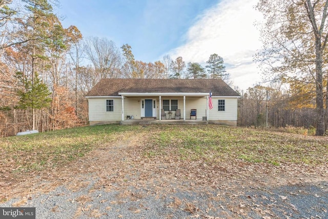 view of front of property featuring covered porch