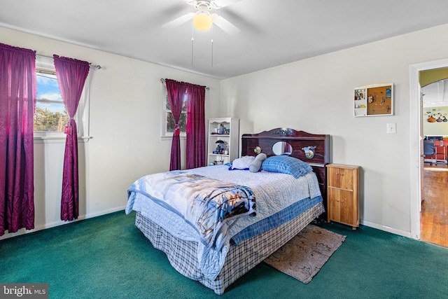 carpeted bedroom featuring ceiling fan