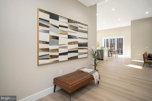 sitting room with light hardwood / wood-style floors