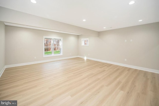 basement featuring light hardwood / wood-style floors