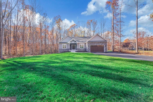 single story home featuring a front yard and a garage