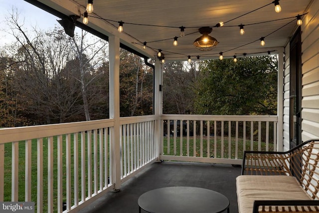 exterior space with ceiling fan