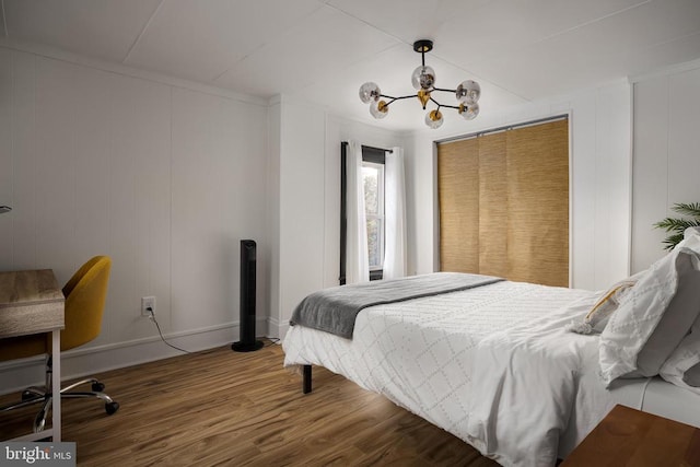 bedroom featuring wood-type flooring