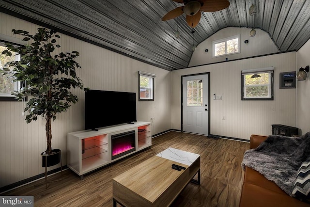 living room with ceiling fan, wood walls, lofted ceiling, wood ceiling, and hardwood / wood-style flooring