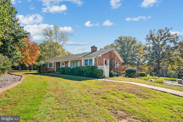 ranch-style house with a front yard