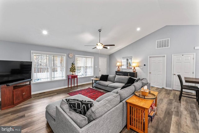 living room featuring high vaulted ceiling, ceiling fan, and dark wood-type flooring