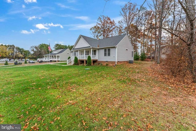 exterior space featuring a yard and a porch