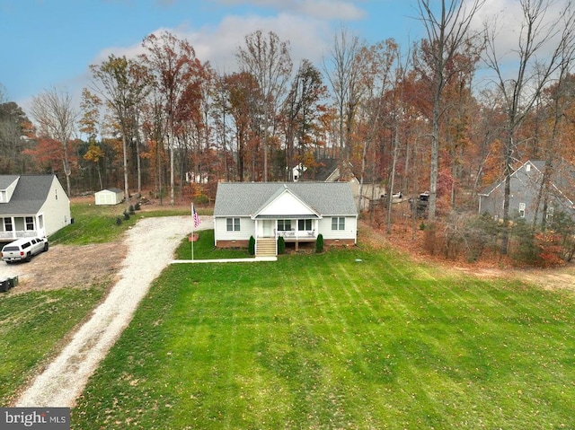 view of front facade with a porch and a front yard