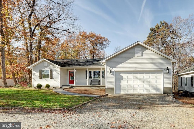 ranch-style home with a porch, a garage, and a front yard