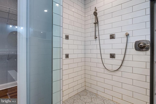 bathroom with an enclosed shower