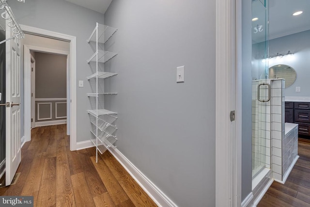 hall featuring dark hardwood / wood-style floors