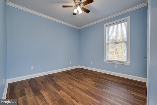 unfurnished room with ceiling fan, dark hardwood / wood-style flooring, and crown molding