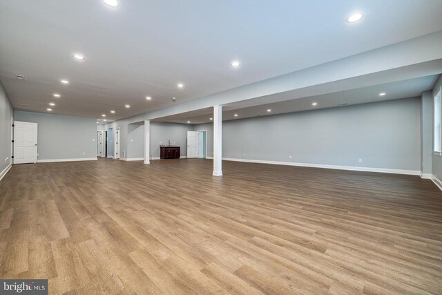 basement with light wood-type flooring