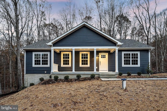 view of front facade featuring covered porch