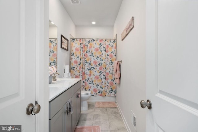 full bathroom with tile patterned flooring, vanity, shower / bath combination with curtain, and toilet