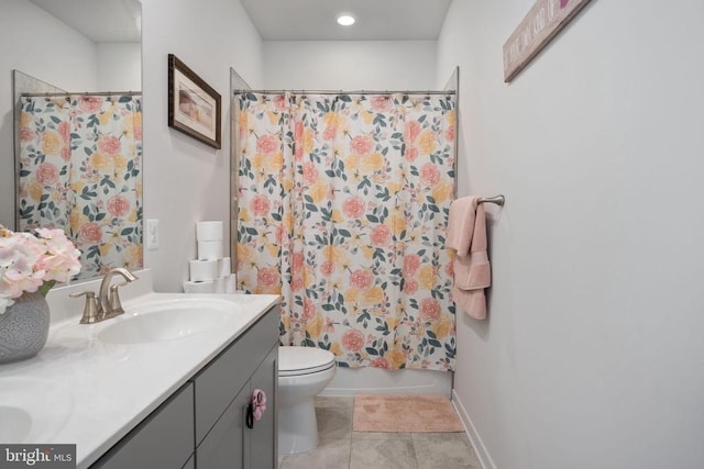 full bathroom with tile patterned flooring, vanity, toilet, and shower / tub combo