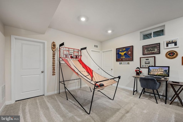 game room featuring light colored carpet