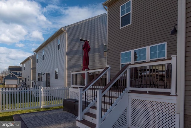 back of house with a patio